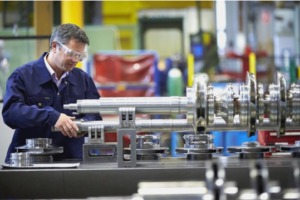 Employee at Sulzer working on a project after receiving fast turnaround carbon parts.